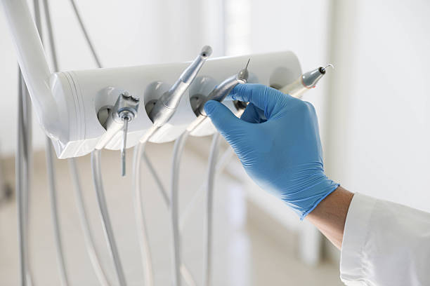 Professional Tooth Extraction technician working in Weddington, NC